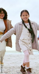 Happy family on beach, playing with parents and child, fun bonding games and laughing together on vacation. Ocean, holiday adventure and mom, dad and excited girl running with smile, sea and nature.