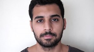 Sarcastic slow clap with sarcastic facial expressions. Attractive man claps slowly with sarcastic face and expression.