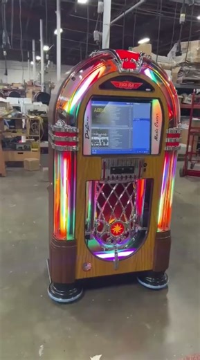 Hot off the line, a Crystal digital music center in an American walnut cabinet #jukebox #rockola