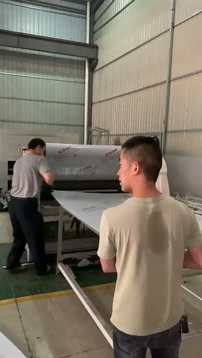 protective foil application machine on sheet materials
