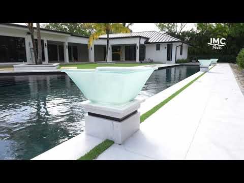 Modern Backyard Transformation — White Marble & Raised Spa in South Florida | JMC Pools