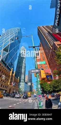 New York, USA, 1 April 2026: Modern glass architecture of Hearst Tower from low angle street view. Low angle view of the triangulated glass facade of the Hearst Tower skyscraper in New York City.