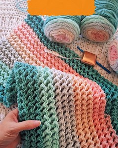 Looking for a relaxing project with stunning results? This pattern helps you create a plush, textured blanket in any size using an easy repeat. Get yours now! 👉 craftrly.com/waffle | Craftrlly