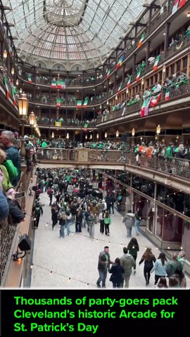 Thousands of party-goers pack Cleveland's historic Arcade for St. Patrick's Day