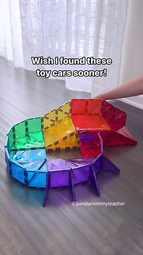 Construct a magnetic tile track and watch these cars bring the excitement to life! 🚙🚗 Car link in bio! 📥SAVE to try ➡️SHARE with a friend ❤️ FOLLOW for more #stemtoys #stemforkids #magnetictiles #invitationtoplay #openendedtoys #playislearning #connetixtiles #stemplay #pandamommyteacher #racetrack #connetix #learningthroughplay #diyracetrack #toycars