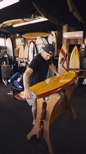 Russell Surfboards on Instagram: "Wiping down a new Bonzer model in the shop. 6’6 with double resin pinlines, gloss and polish with glass on Bonzer runners."