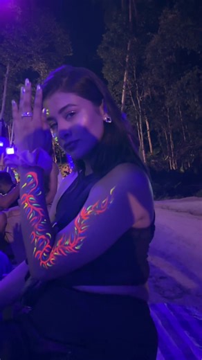 Neon Body Paint Showcase at Nighttime Festival
