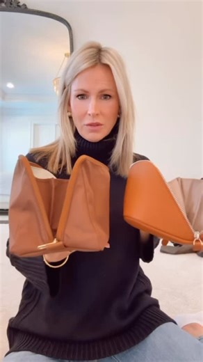 Anna Daly | Classic Style & Beauty Over 40 on Instagram: "Packing content is clearly having a moment so here we are 😅 I already have my Parallel bag that I use for toiletries, but when I travel I need a separate makeup bag—especially when I’m wearing more makeup than usual. I’m stuck between these two clamshell bags: • one is structured, leather, beautiful • the other is less structured but 100% washable Both are great quality, both around the same price, and I love that clamshell style so I ca