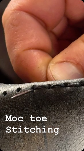 Hand sewing the moc toe into this leather boot build! Here we are running a saddle stitch through a very carefully positioned set of holes that will match the toe profile. The hole pairings need to be perfectly perpendicular to the curve all the way around in order for the pinched ridge to stay true. I was originally inspired to try this moc toe stitch method by a beautiful reel from @onderhoud.handmade , but I see it showing up in some more of the big guys designs now too which is really cool. 
