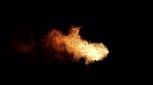 Fireball burning with fire flame transition reveal isolated on black background