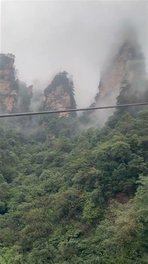 Zhangjiajie, Hunan, China — a glass elevator up the cliff. 🇨🇳 Avatar Mountains ⛰️