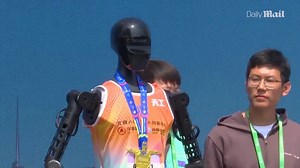 Chaos at China's man vs machine race as robots fail to finish