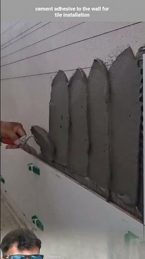 cement adhesive to the wall for tile installation