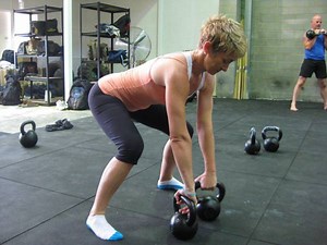 How to Do the Perfect DOUBLE Kettlebell Clean - Breaking Muscle