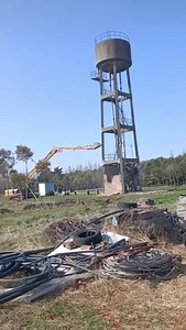 Crazy Excavator working with building | Machinery Magazine
