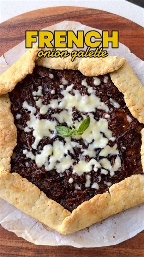 Flaky French Onion Galette Recipe🧅👇🏻 Delicious French Onion Galette with caramelized onions 🧅✨, melty cheese 🧀 and flaky crust - your cozy savory pie dream! 😍 Slow-cook onions to golden perfection, layer on a buttery dough, and bake until bubbly. Perfect for tea-time or dinner vibes! 🔥 INGREDIENTS Dough: 4 Medium Onion 2 Tsp (10g) Oil 1 Tbsp (15g) Butter 1 Tsp (4g) Sugar 1/4 Cup (60ml) Water 1/2 Tsp (1g) Pizza Mix Salt Topping: 1 & 1/2 Cup (180g) All Purpose Flour/Maida 1 Tsp (2.5g) Pizza
