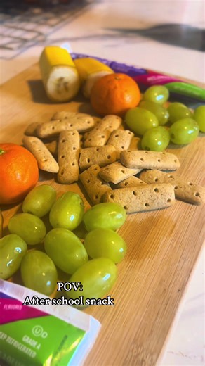 🍎 Tip Tuesday: Snack Time SOS! ⏰ That 3 PM energy crash and resulting hunger is real! But after-school snack time doesn't have to be chaotic. We love a good snack board (check out this one with fruits, graham crackers, and yogurt!) because it’s fun, customizable, and makes healthy options look irresistible. Here are a couple of life-saver tips to make the 3 PM feeding frenzy easier on you, Mom: 1. Create a 'Grab-and-Go' Snack Zone: Dedicate a specific, low-shelf area in your pantry and fridge f