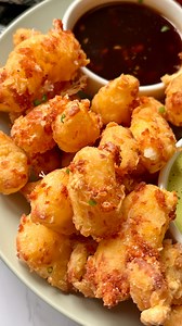 Crispy, melty fried cheese curds with the ultimate dip duo: a bright, herby Miso Green Goddess and a sticky-spicy Sweet Chili Sauce. Golden crunch, big cheese pulls, and two crave-worthy dips you’ll want to drizzle on everything. The perfect party appetizer, game day snack, or holiday crowd-pleaser. Full recipes for the curds and both sauces are on my site! ✨ So make sure to Follow and Comment “CHEESY” for a link to the recipes! . . . . #friedcheesecurds #appetizerrecipes #holidayappetizers #che