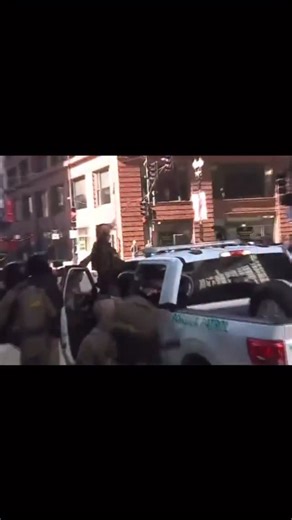 Gregory Bovino exits the federal courthouse like he’s giving a Nazi salute hand signals, fascist vibes, history repeating itself the moment his testimony ends. | Ashley Salazar