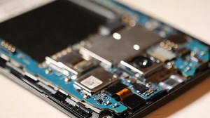 Close up of a smartphone print plate, slider moves in.
