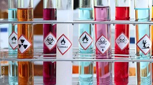 Warning symbol for chemical hazard on test tube, chemical in factory