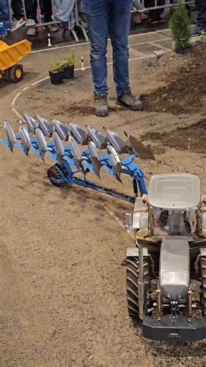 RC-World-Studio II on Instagram: "Huge tractor ploving the land, 1/8 scale giant 🚜🚨🎮 . . #rctractor #messe #messefriedrichshafen #friedrichshafen #rcvehicle #rchobbies #rctruck #rccars #rcworld #construction #rchobby #rcmodel #RC #rccommunity #heavyequipment #heavymachinery #heavyduty #rctraktor #radiocontrol #remotecontrol #hobby #hydraulics #event #rcevent #rctoys #toysforthebigboys"
