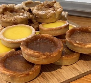 5.1K views · 64 reactions | This famous Canadian dessert consists of a flaky pastry shell filled with a rich buttery caramel center. It’s a perfect sweet indulgence whether you’re Canadian or not. If you have never tried Butter Tarts, well you need to! Sweet, delicious and Homemade. What's better than a butter tart?  Toronto, Canada : Bring Me #canada  #canadadestination | Canada Destinations | Facebook