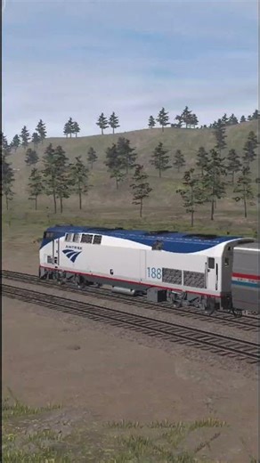 Amtrak passenger train taking a smooth curve through the mountains 🚆#Railfan #AmericanRailroad #Fr
