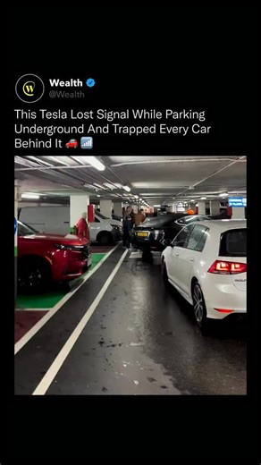 Wealth on Instagram: "One software freeze turned a routine parking attempt into a 40-minute standstill. ⚠️📡 In an underground garage, a Tesla suddenly became immobile mid-parking. With no mobile signal underground, the car couldn’t reboot its system, leaving it stuck in place and blocking every vehicle behind it. Dozens of drivers were forced to wait as traffic above ground began backing up into nearby streets. The fix wasn’t mechanical or manual. It required secure Wi-Fi access so the car coul