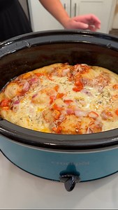 10K views · 125 reactions | Delicious crockpot pizza Olivia uses Pillsbury biscuits, butter, garlic powder, pizza sauce, red onion, red pepper, mozzarella cheese and Italian seasoning to make a fun pizza dish. This original video was produced by Network Media LLC and Olivia | Tales from the Test Kitchen | Facebook