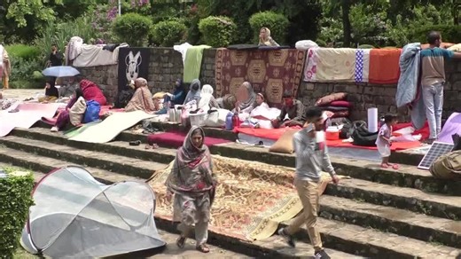 Evicted Afghan refugees huddle in Islamabad park, dreading return home