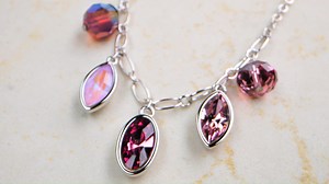 What happens when the calm stability of blue meets the fierce energy of red? Purple reigns supreme! Two new Swarovski crystal colors – Iris and Amethyst Ignite – take center stage. This trending color of the season is the perfect pop of color to add to your fall outfits. https://touchstonecrystal.biz/PurplePassion #Purple #wristparty #jewelry #newcollection | Touchstone Crystal