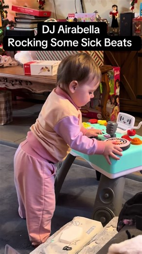 She loves her new DJ table from @Fisher-Price #christmasgiftideas #djtable #fisherprice #babytoys #momtok