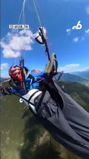 Heart-stopping moment paraglider is clipped by plane in mid-air collision