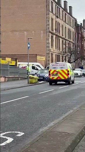 Police race to Glasgow street amid ongoing incident as area taped off