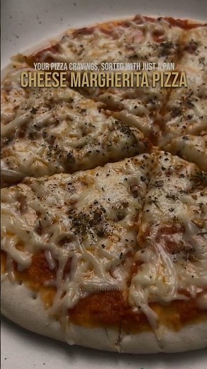 Cheesy Margherita Pizza with fresh basil, juicy tomatoes & golden crust—pure Italian comfort! 🍕❤️
