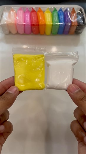 Mixing colours 💛+🤍=??? #satisfying #polymerclay #mix #trending