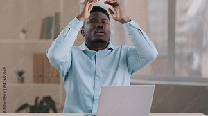 Frustrated shocked african businessman american adult man student work on computer make error mistake feels stress upset with bad news failure e-commerce exam lost internet connection lose online bet Stock Video