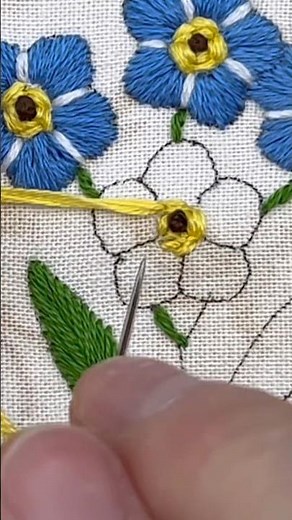 Stitching the center of forget me nots - flower hand embroidery pattern.