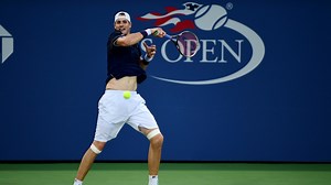 Isner rides big serve into third round