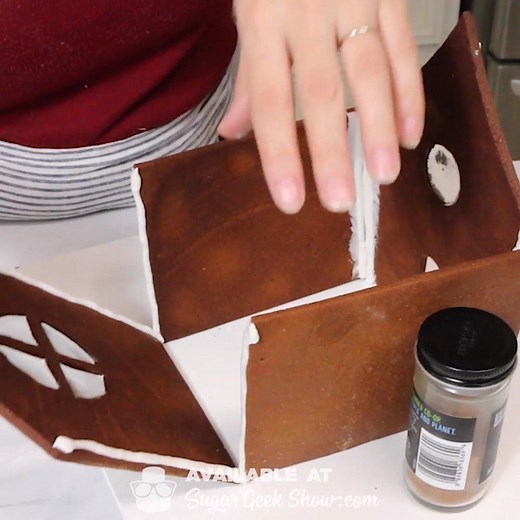 Try to knock this gingerbread house down, I dare you! ⁠ ⁠ This construction-grade gingerbread recipe will keep your house standing all season long. It's very hard, so it's not great for eating but it doesn't have any leavening in it so it won't puff or spread at all. If you’re looking to take your gingerbread house to the next level, check out this recipe. ⁠ ⁠ Recipe: https://sugargeekshow.com/recipe/gingerbread-house-techniques/ | Sugar Geek Show