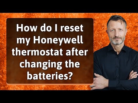 How do I reset my Honeywell thermostat after changing the batteries?