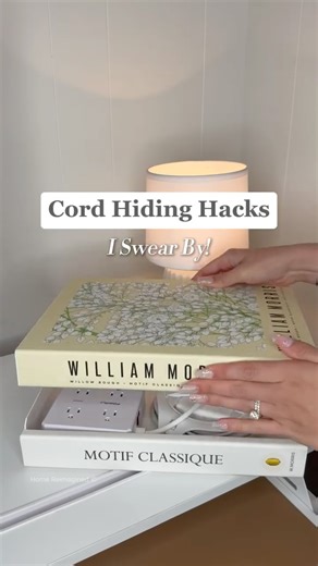 Home Reimagined ✨Cleaning, Organizing & Home Hacks on Instagram: "✨Comment “CORD” and I will send you a DM with the links to these products! ✨ Or, as always, find them in my Amazon Shop, linked in my bio (see Amazon list: “Office Organization") ❤️ ✨Cord Clutter… Be Gone! ✨ Tired of messy wires and tangled cords ruining the look of your home? These cord hiding hacks are my go-to for a clean, organized, and aesthetic space! 🙌🏼 📚 Decorative Book Cable Management Box – Perfect for your desk or ni