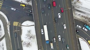 Bird's eye view on moving cars on the road