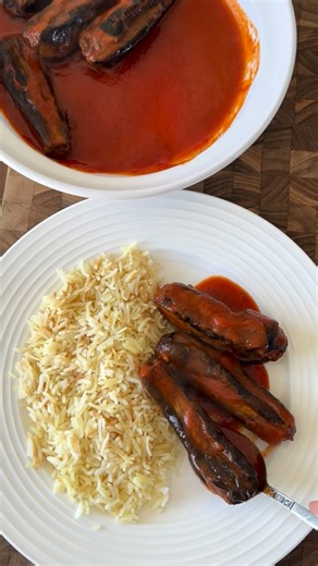 Bayan’s kitchen 🥣 on Instagram: "Syrian Sheikh El Mahshi Eggplant stuffed with lamb, cooked in a tomato sauce MAKES A SMALL POT - DOUBLE RECIPE FOR A FAMILY 1lb baby eggplants (the smallest you can find) 1/2 lb ground lamb or beef 1/2 tsp salt 1/4 tsp pepper Olive oil for brushing Tomato sauce: 1 cup passata 2 cups water 1/2 tsp salt (to taste) 1/4 tsp black pepper Garlic yogurt: 1 cup plain yogurt 1 small garlic clove, crated 1/2 tsp salt (to taste) Serve with: vermicelli rice Garnish: Toasted