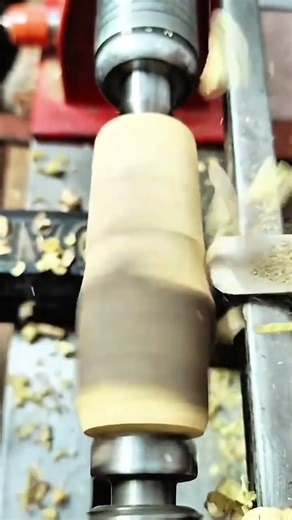 the process of smoothing the surface of wood using a rotary machine and chisel