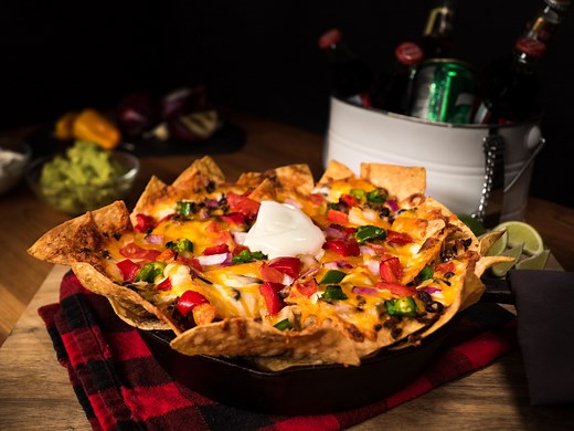 If you don't have a go-to nacho recipe for next football season... well, you might now. Introducing our Ultimate Chili Cheese Nachos recipe. https://fal.cn/UltimateChiliCheeseNachos | Char-Broil