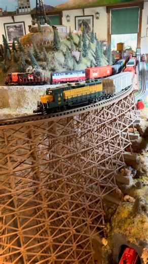 Model Trains Enthusiast on Instagram: "Parallel running on a narrow bridge. Scale modeling at its limits. #modelrailroad #modeltrains #railroadbridge #scalemodel #freighttrain"