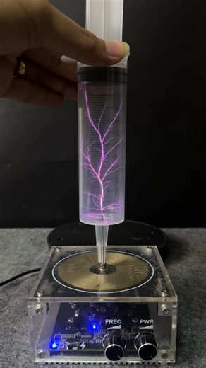 Collecting lightning from Tesla coil #experiment #teslacoil #shorts