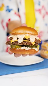 A burger stacked to perfection starts with Wonder Buns 😌🍔 Find recipes like this one here: https://bit.ly/401aVhF | Wonder Bread USA